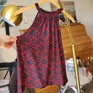 Michael Kors Top size XS will fit XS and S